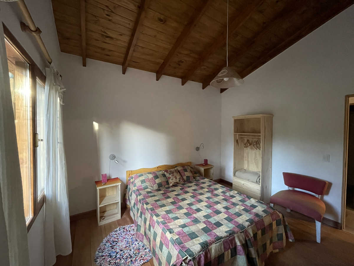 Dormitorio de la cabaña Ciprés