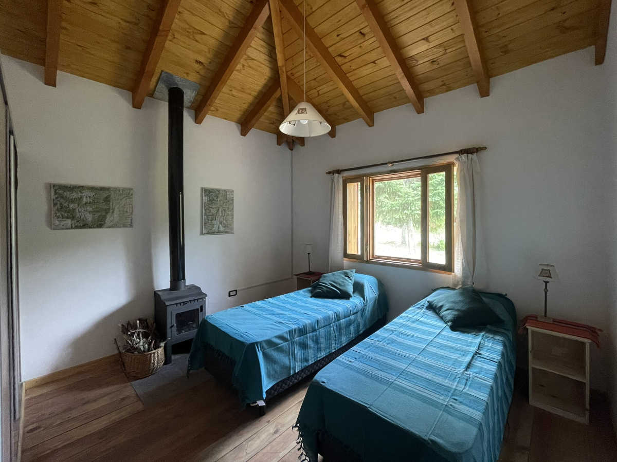 Dormitorio de la cabaña Coihue